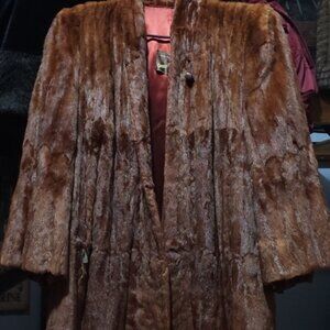 Real mink fur coat with silk lining by Carson Pirie Scott and Co